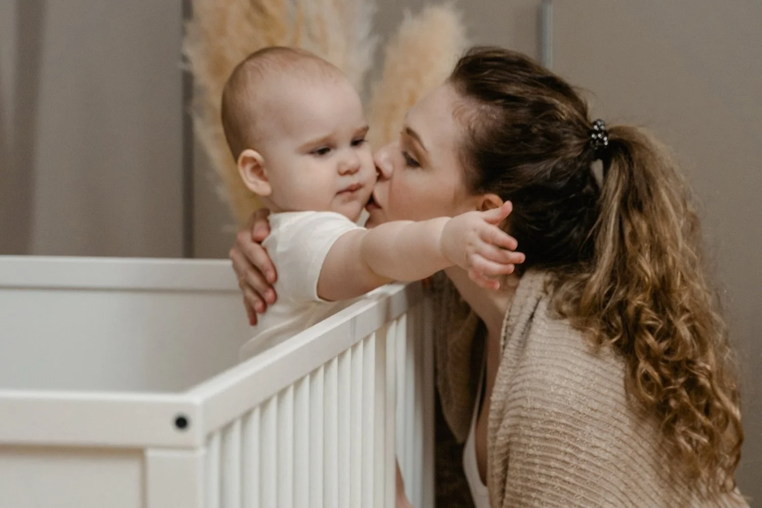 Mom managing a nighttime awakening of her baby